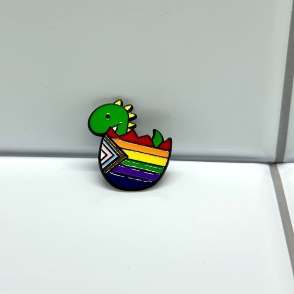 Pride dinosaur enamel pin​‎